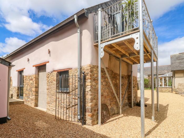 Becket's Barn in Northlew in Devon. Two-bed barn conversion with original features & private balcony