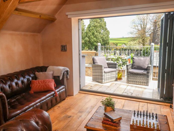 Becket's Barn in Northlew in Devon. Two-bed barn conversion with original features & private balcony