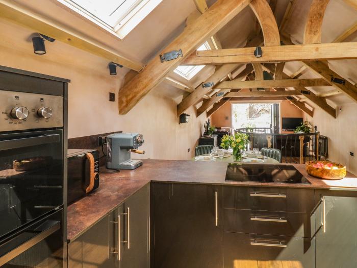 Becket's Barn in Northlew in Devon. Two-bed barn conversion with original features & private balcony