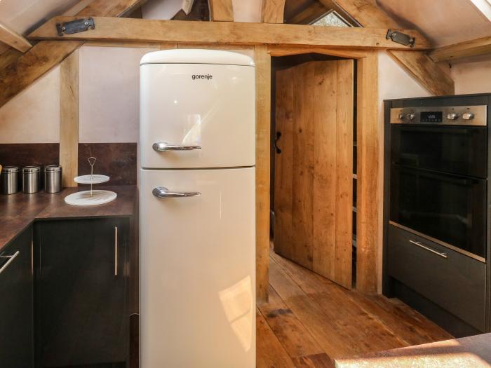 Becket's Barn in Northlew in Devon. Two-bed barn conversion with original features & private balcony