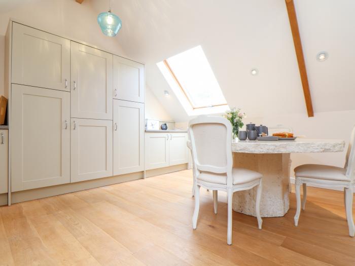 Potters Barn in Helston, Cornwall. Pet-friendly. Stone-built conversion. Reverse level. Two bedrooms