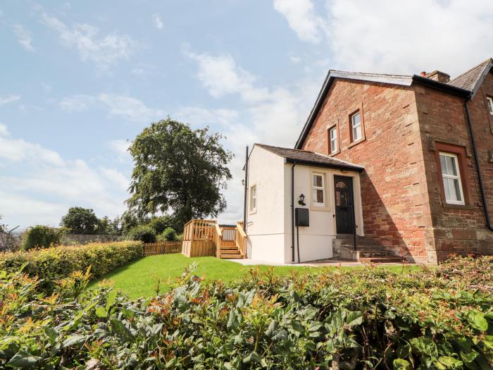 Rose Bank Cottage in Dalston, Cumbria. Three-bedroom home, with private sun terrace. Countryside.