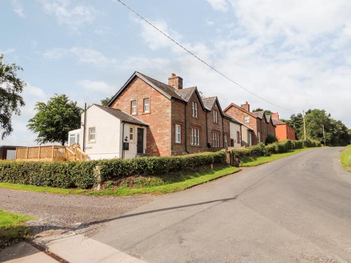 Rose Bank Cottage in Dalston, Cumbria. Three-bedroom home, with private sun terrace. Countryside.