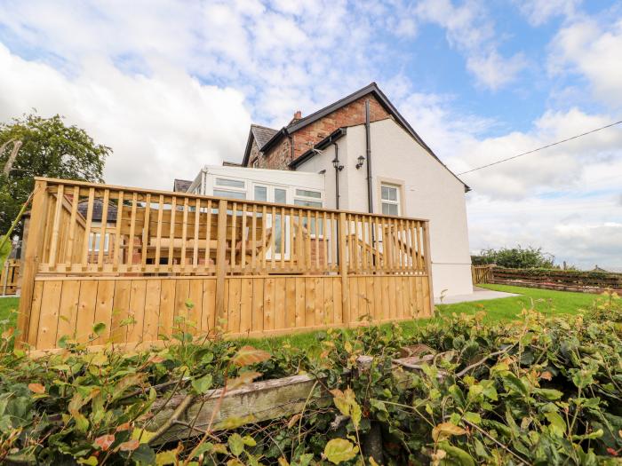 Rose Bank Cottage in Dalston, Cumbria. Three-bedroom home, with private sun terrace. Countryside.