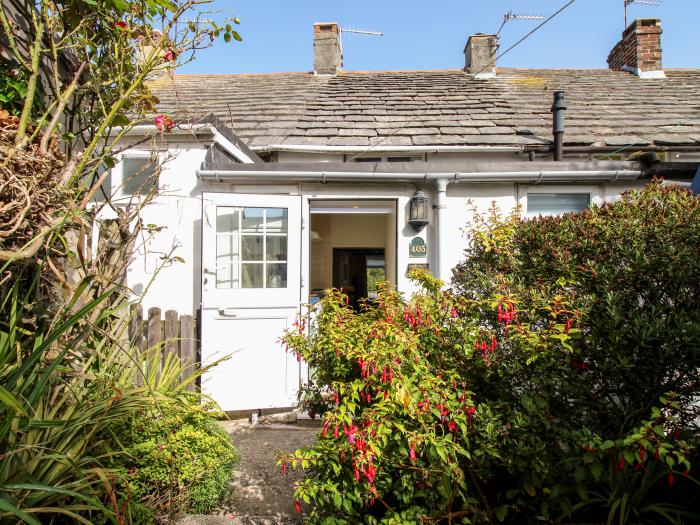 405 High Street, Swanage, Dorset. One-bedroom cottage, resting near a beach and amenities. Character