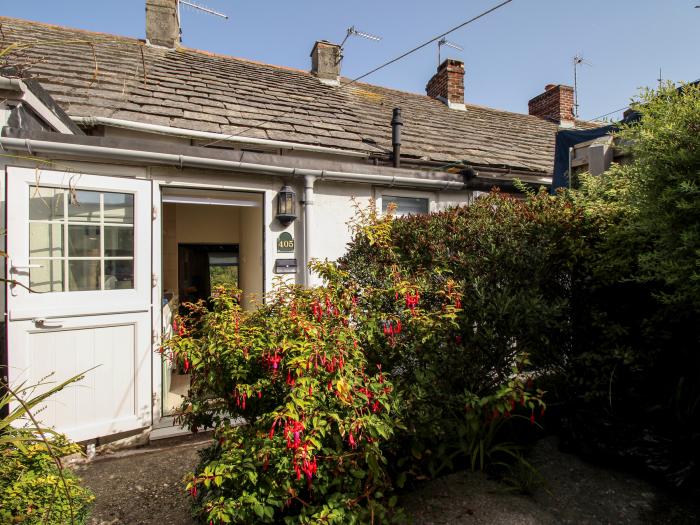 405 High Street, Swanage, Dorset. One-bedroom cottage, resting near a beach and amenities. Character