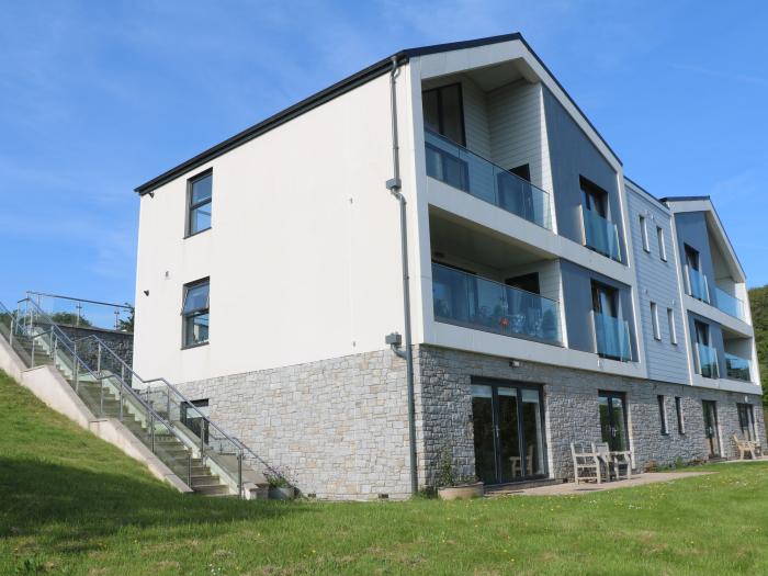 2 The Dunes is near Falmouth, in Cornwall, ground-floor apartment with sea and beach views, central