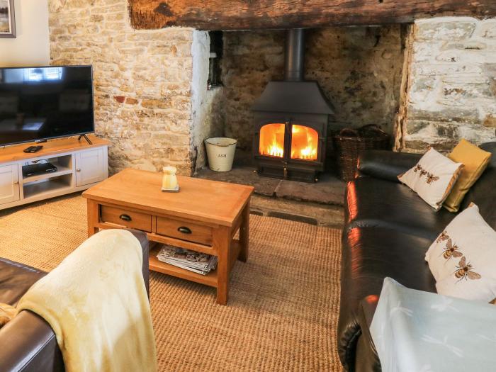 The Bake House in Bettws in Bridgend. Romantic dwelling with woodburning stove and exposed stonework