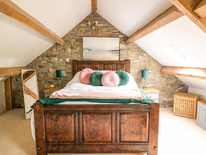 The Bake House in Bettws in Bridgend. Romantic dwelling with woodburning stove and exposed stonework