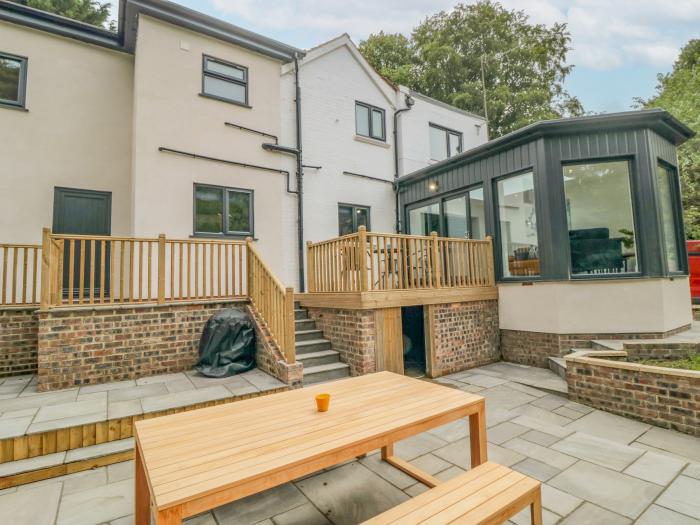 Riverside House in Scarborough, North Yorkshire. Multilevel garden. Games room. Off-road parking.