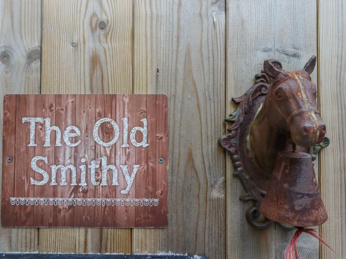 The Old Smithy, Amble, Northumberland. Close to a shop and a pub. Pet-friendly. Family holiday home.