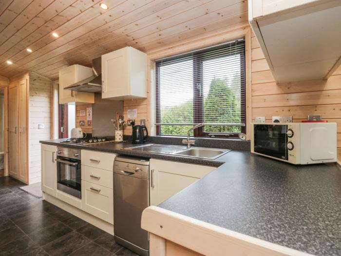 Canadian Cabin 37, is in Keswick, Cumbria. Off-road parking, in a National Park, pet-friendly, 2-bed