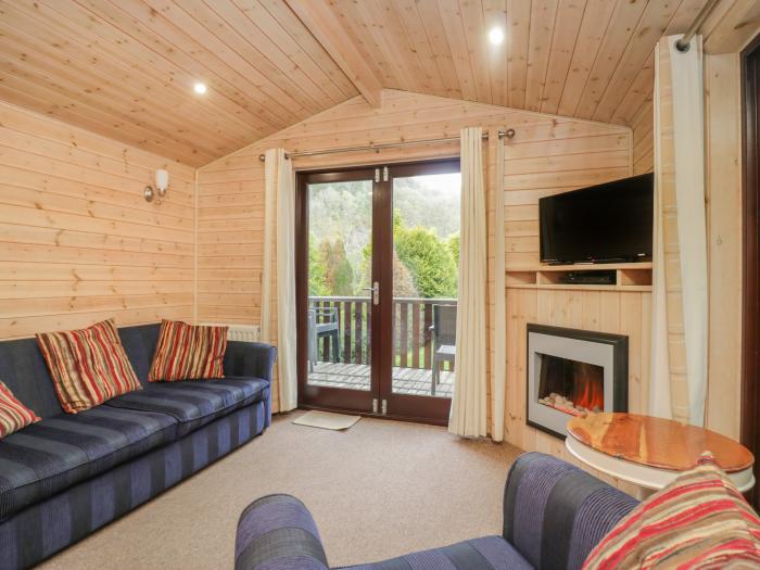 Canadian Cabin 37, is in Keswick, Cumbria. Off-road parking, in a National Park, pet-friendly, 2-bed