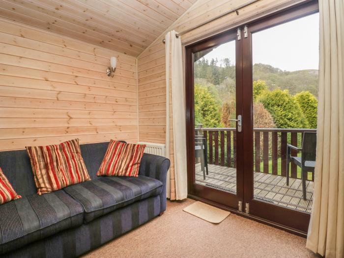 Canadian Cabin 37, is in Keswick, Cumbria. Off-road parking, in a National Park, pet-friendly, 2-bed