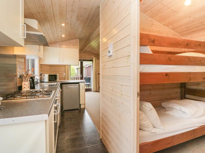 Canadian Cabin 37, is in Keswick, Cumbria. Off-road parking, in a National Park, pet-friendly, 2-bed