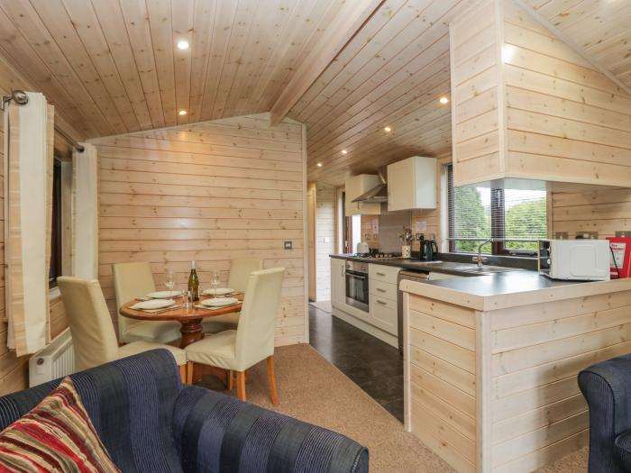 Canadian Cabin 37, is in Keswick, Cumbria. Off-road parking, in a National Park, pet-friendly, 2-bed