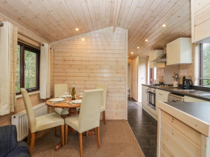 Canadian Cabin 37, is in Keswick, Cumbria. Off-road parking, in a National Park, pet-friendly, 2-bed