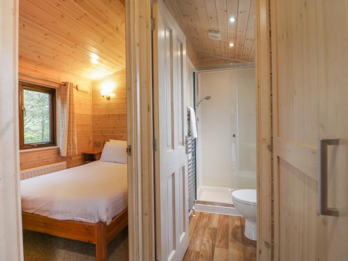 Canadian Cabin 37, is in Keswick, Cumbria. Off-road parking, in a National Park, pet-friendly, 2-bed