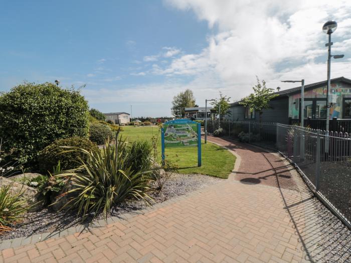 Finch 5 on Cayton Bay Holiday Park, North Yorkshire. 3 bedroom lodge with open-plan living & decking