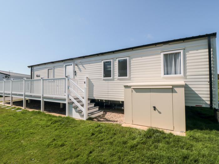 Finch 5 on Cayton Bay Holiday Park, North Yorkshire. 3 bedroom lodge with open-plan living & decking