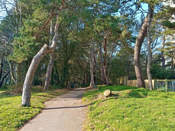 The Pines in Bournemouth in Dorset. First-floor apartment with woodland and sea views. Two bedrooms.