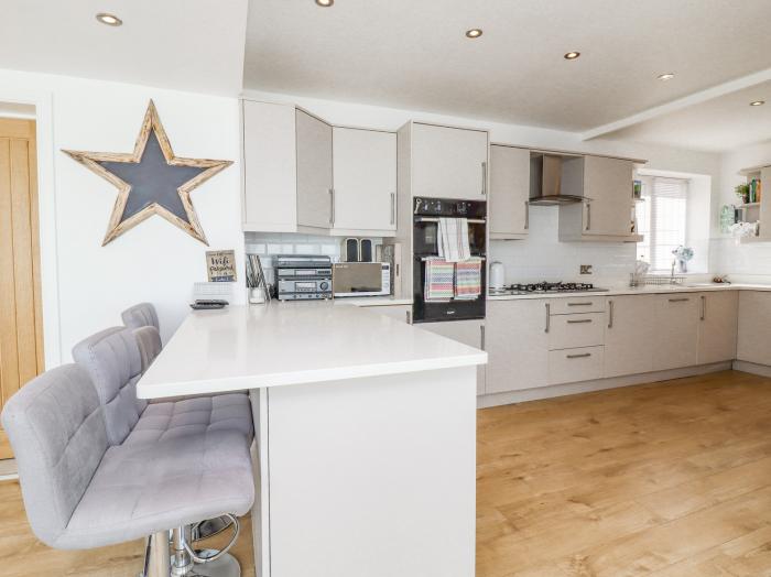 Bophut House in Tarleton, Lancashire. Four-bedroom, contemporary home with garden. Near beach.