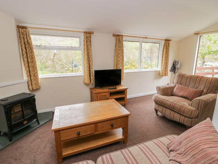 Beech Timber Lodge is in Keswick, Cumbria, off-road parking, in a National Park, pet-friendly, 2bed.