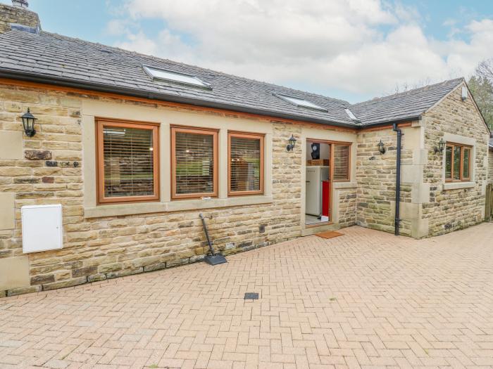 4 Pheasant Lane, is near Stocksbridge, South Yorkshire. Three-bedroom home, with hot tub and garden.