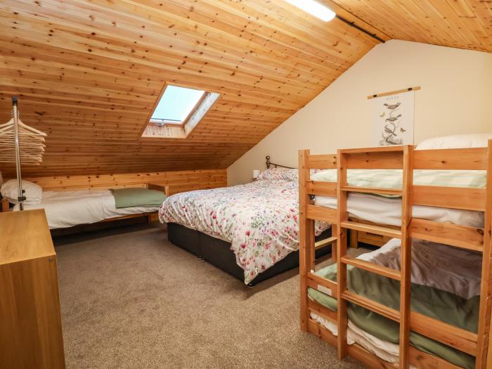 The Old Nursery near Bangor-On-Dee, Wrexham. Wood-cladded home set rurally. Pet and family-friendly.