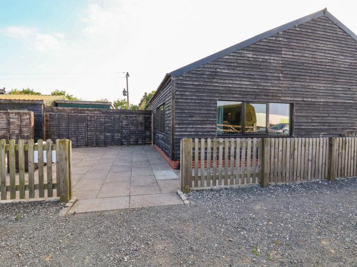 The Old Nursery near Bangor-On-Dee, Wrexham. Wood-cladded home set rurally. Pet and family-friendly.