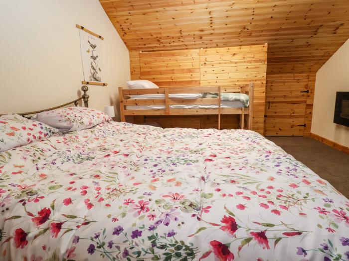 The Old Nursery near Bangor-On-Dee, Wrexham. Wood-cladded home set rurally. Pet and family-friendly.