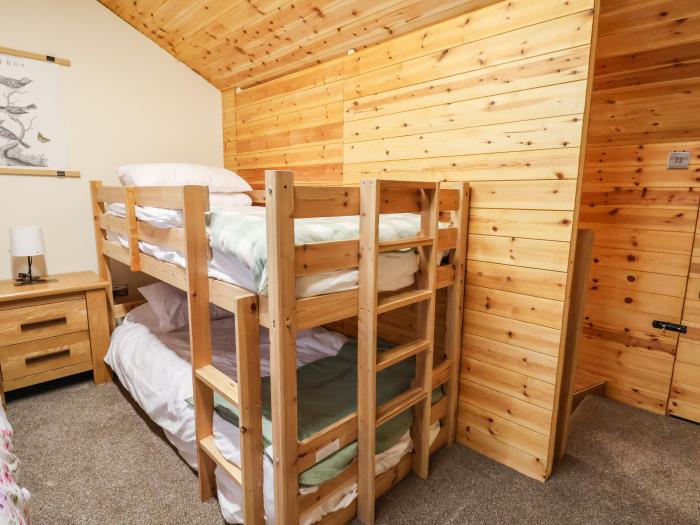 The Old Nursery near Bangor-On-Dee, Wrexham. Wood-cladded home set rurally. Pet and family-friendly.