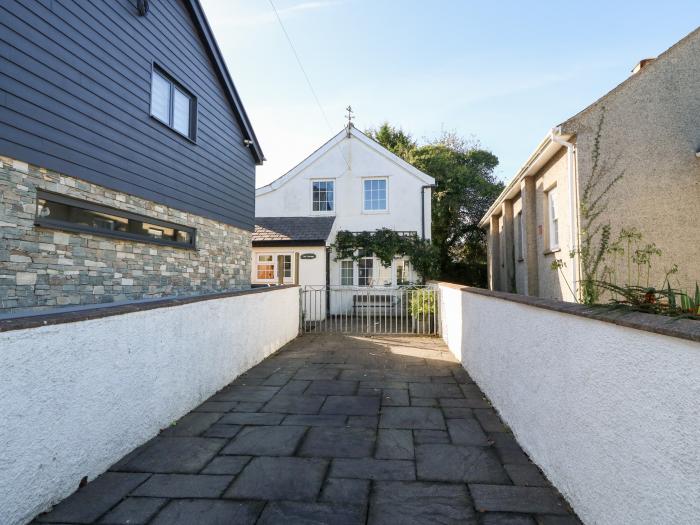 The Cottage, based in Abersoch, Gwynedd. Short walk from the beach and amenities & open-plan living.