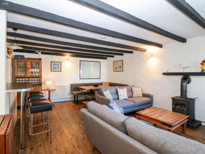 The Cottage, based in Abersoch, Gwynedd. Short walk from the beach and amenities & open-plan living.