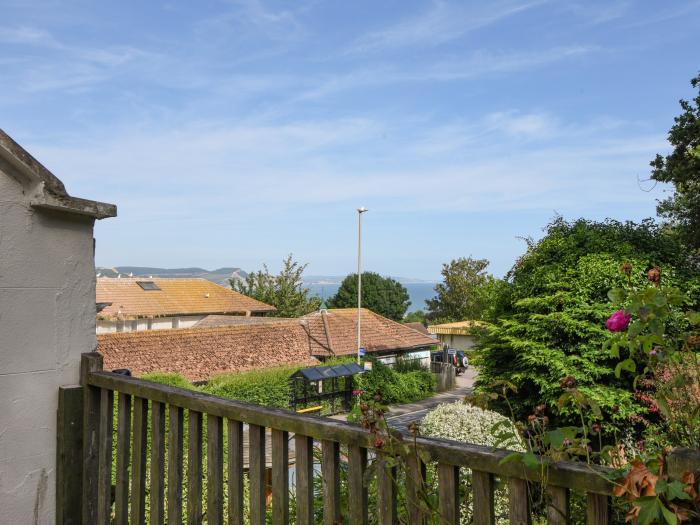 Braeside is in Lyme Regis, in Dorset. Five-bedroom home with sea views, and near beach and amenities