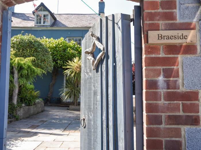 Braeside is in Lyme Regis, in Dorset. Five-bedroom home with sea views, and near beach and amenities