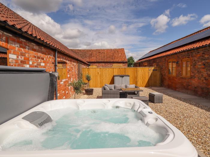 The Grange Cottage 1 in Ashby-cum-Fenby near Waltham, Lincolnshire. Hot tub. Near an AONB. Open plan