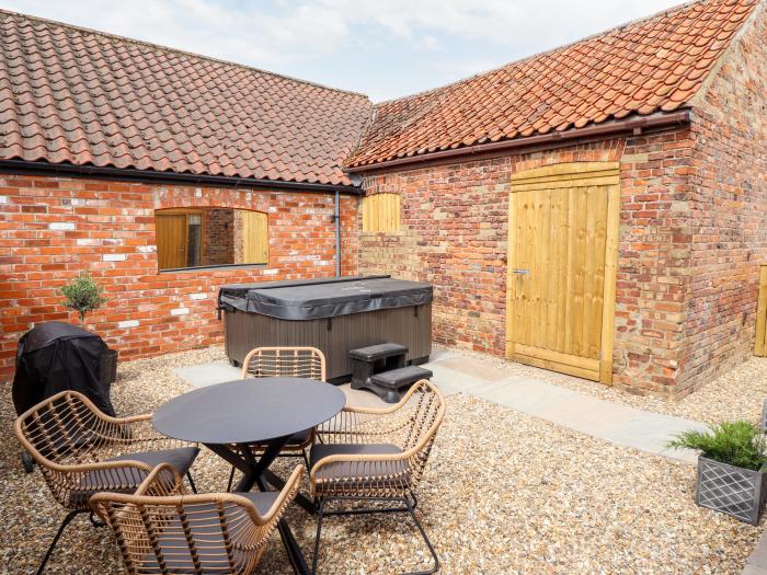 The Grange Cottage 2 in Ashby-cum-Fenby near Waltham, Lincolnshire. Hot tub. Near an AONB. Open plan