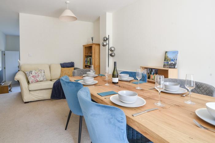 6 Barnes Meadow in Uplyme, Devon. Close to a beach. In an AONB. Dog-friendly. Three-storey. Parking.