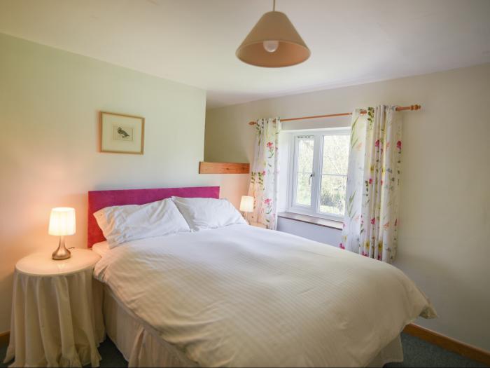 Millwater Cottage, Dalwood, East Devon. Off-road parking. In an AONB. Garden. Pet-friendly. TV. WiFi