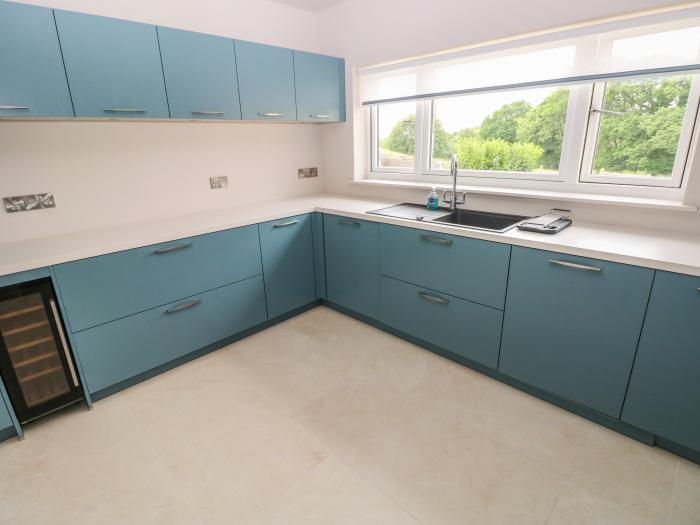 Llety'r Bugail near Glynneath, Rhondda Cynon Taff. Two-bedroom home with EV charger. Near amenities.