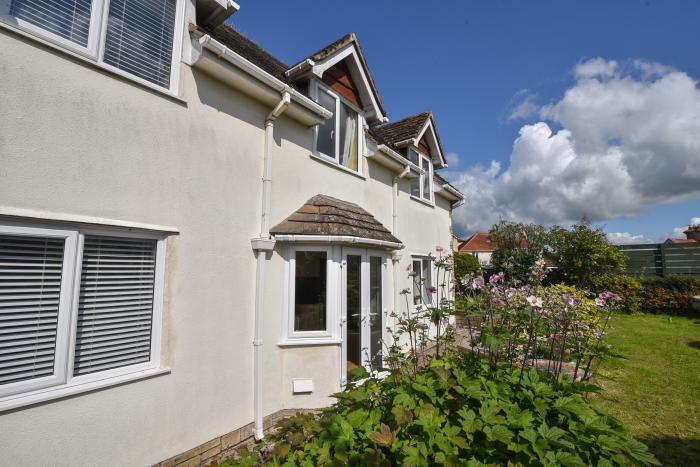 Fawley in Lyme Regis, Dorset. Four bedrooms. Off-road parking. Beach nearby. Electric fire. Smart TV