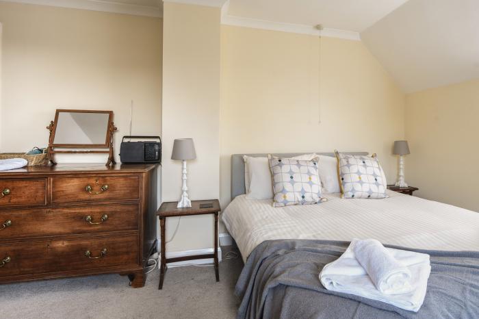 Fawley in Lyme Regis, Dorset. Four bedrooms. Off-road parking. Beach nearby. Electric fire. Smart TV