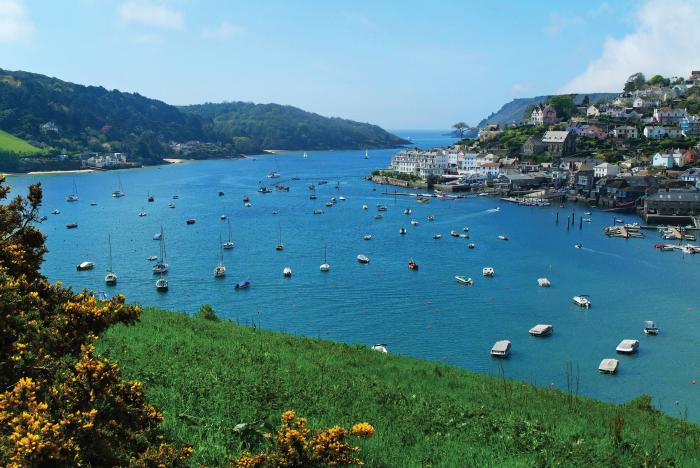 Cranford is in Salcombe, Devon. Three-bedroom home with sea glimpses. In AONB. Near a beach. Stylish