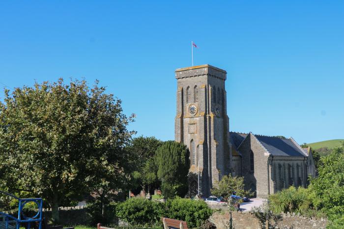 Cranford is in Salcombe, Devon. Three-bedroom home with sea glimpses. In AONB. Near a beach. Stylish