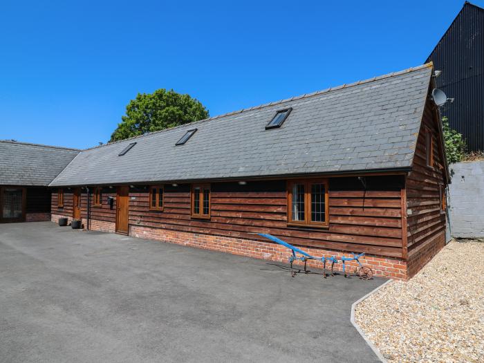 Awelfan is near Bettws Cedewain, Powys. Three-bedroom, barn conversion. Hot tub and enclosed garden.