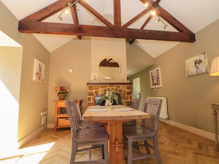 The Old Dairy is near Thirsk, in North Yorkshire. Two-bedroom barn conversion, inviting pets. Rural.