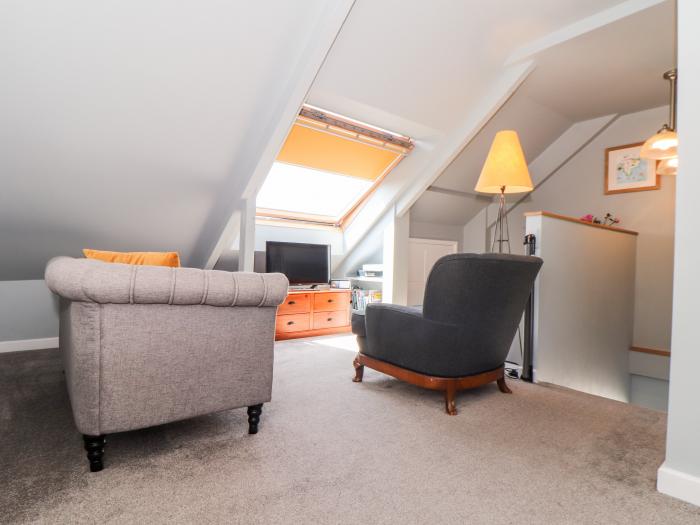 The Attic, Ruan Minor, Cornwall. Off-road parking. Smart TV. Close to amenities and beach. Sea view.