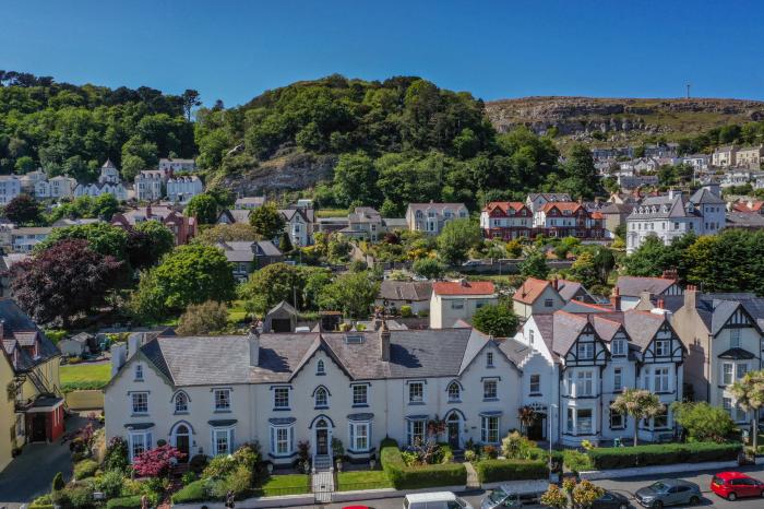 Abbey Lodge, Llandudno, Conwy. Five-bedroom, Grade II listed home & garden. Near a beach.