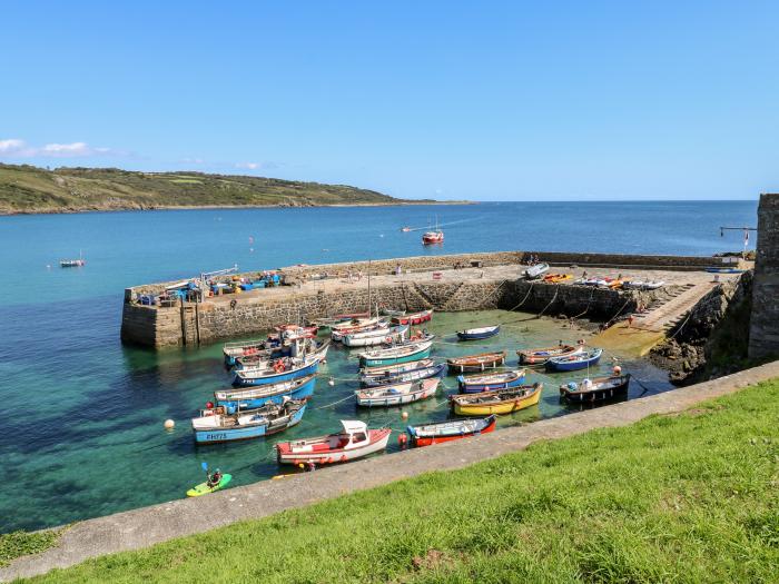 The Mariners in Coverack, Cornwall. Two-bedroom, reverse-level home, enjoying sea views. Near beach.